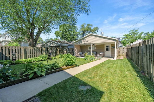 510 Wayne St, Saint Joseph, MI 49085 - back of property with a fenced backyard, an outdoor living space, a patio, and a ceiling fan