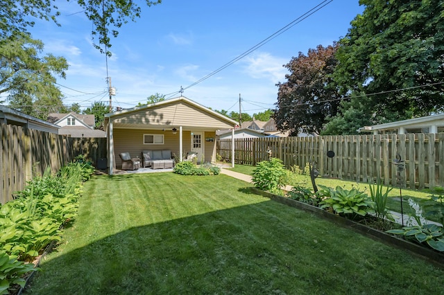 510 Wayne St, Saint Joseph, MI 49085 - back of property with an outdoor hangout area and a fenced backyard