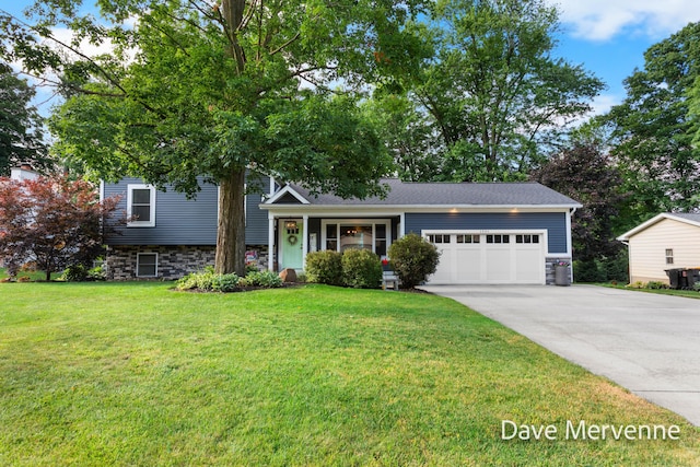 2845 Ridgecrest St SW, Byron Center, MI 49315 - split level home with driveway, a garage, a front lawn, and stone siding