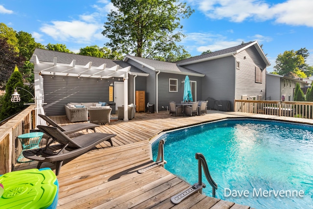 2845 Ridgecrest St SW, Byron Center, MI 49315 - swimming pool with a pergola, a deck, outdoor lounge area, and outdoor dining area