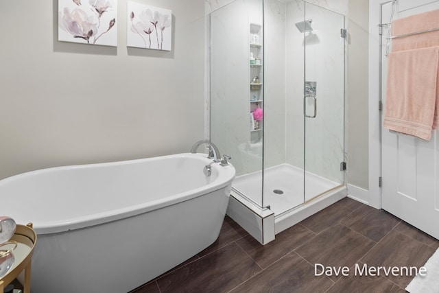 2845 Ridgecrest St SW, Byron Center, MI 49315 - full bath with a freestanding bath and a stall shower