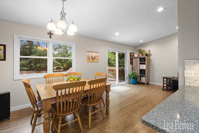 4712 Shank St NE, Rockford, MI 49341 - dining area with wood finished floors, recessed lighting, and a chandelier