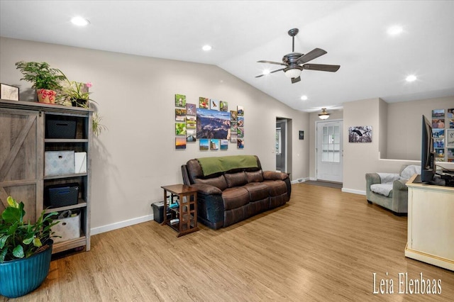 4712 Shank St NE, Rockford, MI 49341 - living room featuring wood finished floors, a ceiling fan, vaulted ceiling, and recessed lighting