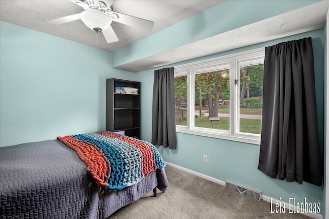 4712 Shank St NE, Rockford, MI 49341 - carpeted bedroom with baseboards and a ceiling fan