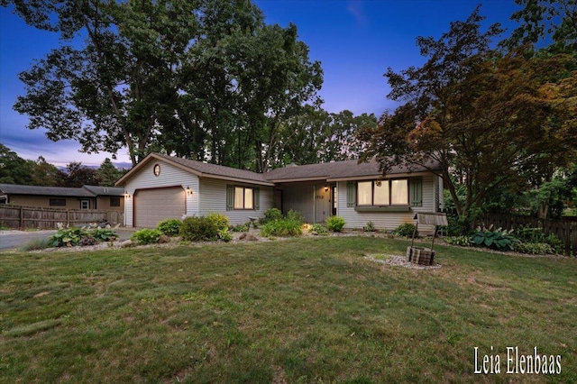4712 Shank St NE, Rockford, MI 49341 - ranch-style house featuring an attached garage and asphalt driveway