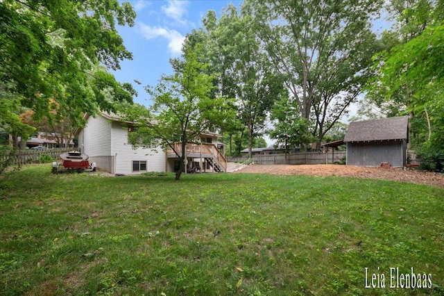 4712 Shank St NE, Rockford, MI 49341 - fenced backyard featuring stairs and a deck