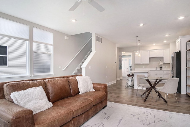2319 Watertown Way, Grand Rapids, MI 49505 - living area featuring wood finished floors, a ceiling fan, recessed lighting, and stairway