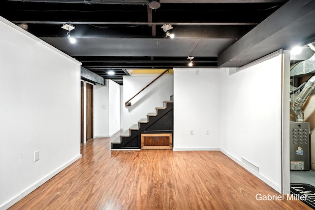 3725 Colby Ave SW, Wyoming, MI 49509 - finished below grade area featuring wood finished floors and stairway