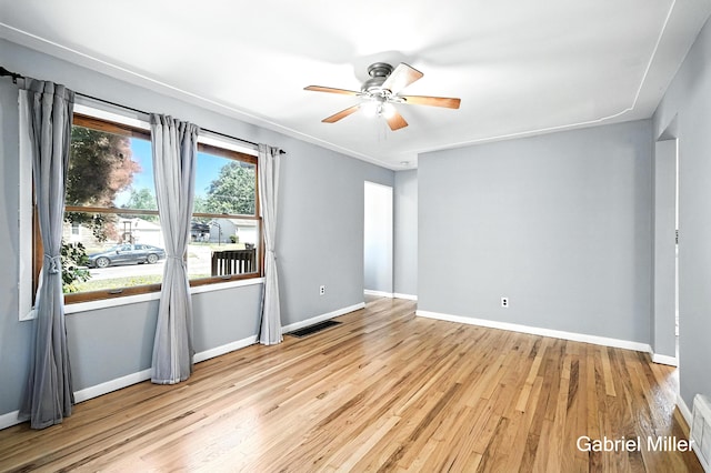 3725 Colby Ave SW, Wyoming, MI 49509 - unfurnished room with wood finished floors and a ceiling fan