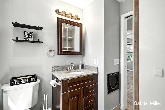 3725 Colby Ave SW, Wyoming, MI 49509 - bathroom with vanity and toilet