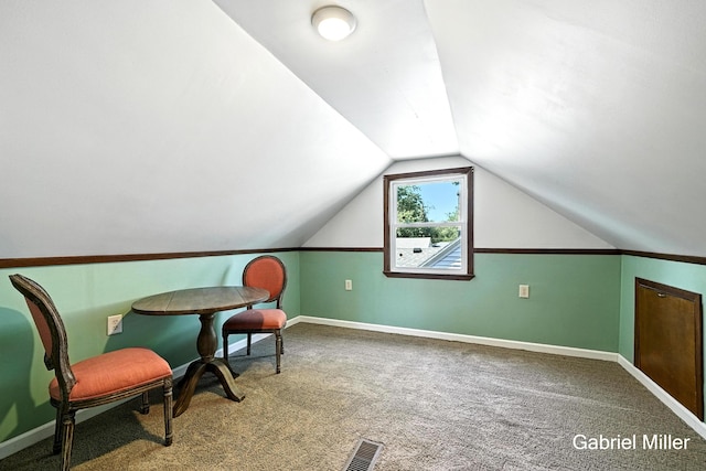 3725 Colby Ave SW, Wyoming, MI 49509 - living area with carpet and vaulted ceiling