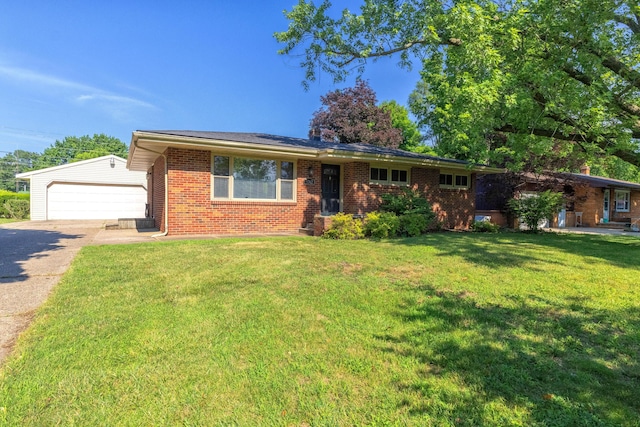 1762 Smyers Dr, Benton Harbor, MI 49022 - ranch-style home featuring an outbuilding, brick siding, and a front yard
