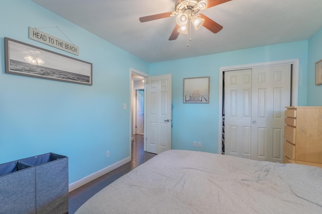 1762 Smyers Dr, Benton Harbor, MI 49022 - bedroom with a closet, dark wood-style floors, and ceiling fan