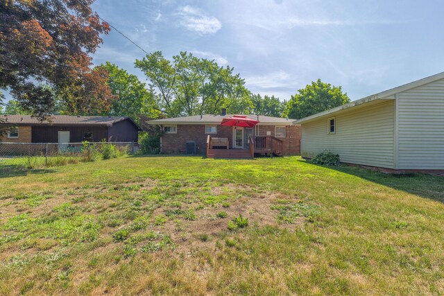 1762 Smyers Dr, Benton Harbor, MI 49022 - view of yard with a wooden deck