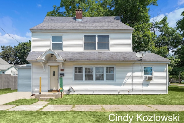 187 Centennial St, Sparta, MI 49345 - view of front of property featuring a chimney and cooling unit