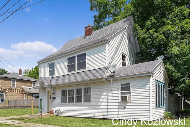 187 Centennial St, Sparta, MI 49345 - view of front of home featuring a chimney