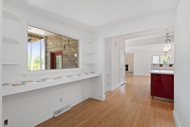 48002 Ridge Rd, New Buffalo, MI 49117 - corridor with wood finished floors and healthy amount of natural light