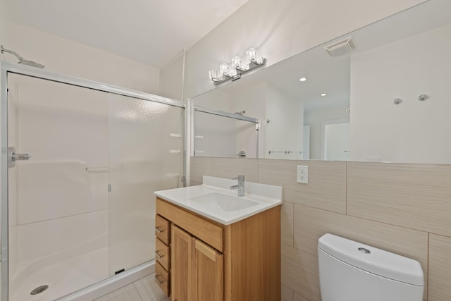 48002 Ridge Rd, New Buffalo, MI 49117 - bathroom with a stall shower, vanity, and tile walls