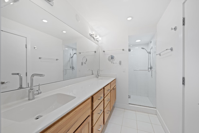 48002 Ridge Rd, New Buffalo, MI 49117 - bathroom featuring tile patterned floors, double vanity, a shower stall, and recessed lighting