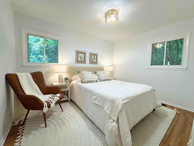 285 Brookside Dr, Ann Arbor, MI 48105 - bedroom with baseboards and light wood finished floors