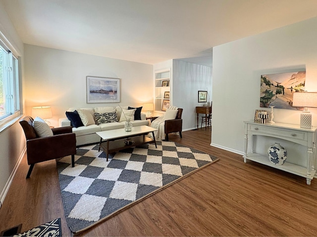 285 Brookside Dr, Ann Arbor, MI 48105 - living room featuring dark wood finished floors and baseboards