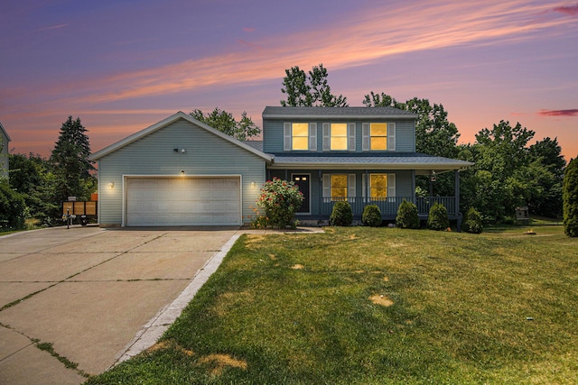 1882 Whistle Stop Dr SE, Grand Rapids, MI 49508 - traditional-style home with a porch, an attached garage, concrete driveway, and a yard