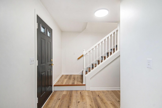 1882 Whistle Stop Dr SE, Grand Rapids, MI 49508 - entryway featuring wood finished floors and stairway