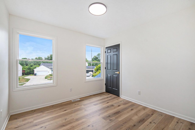 1882 Whistle Stop Dr SE, Grand Rapids, MI 49508 - entryway with light wood-style floors and baseboards