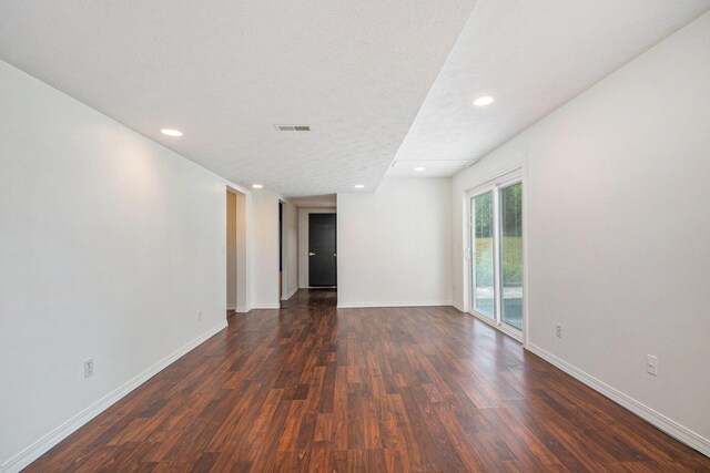 1882 Whistle Stop Dr SE, Grand Rapids, MI 49508 - unfurnished room featuring dark wood finished floors and recessed lighting