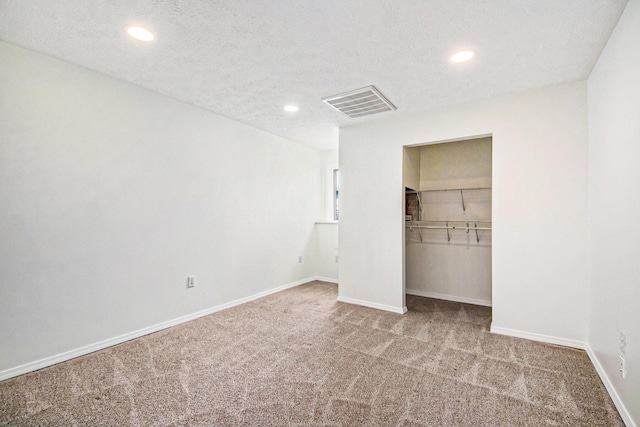 1882 Whistle Stop Dr SE, Grand Rapids, MI 49508 - unfurnished bedroom with carpet, recessed lighting, and a closet
