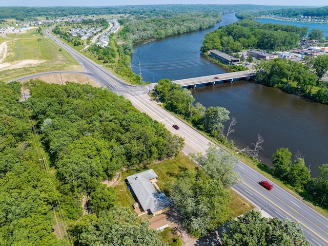 6667 W River Rd NE, Belmont, MI 49306 - drone / aerial view of a nearby body of water and a notable bridge