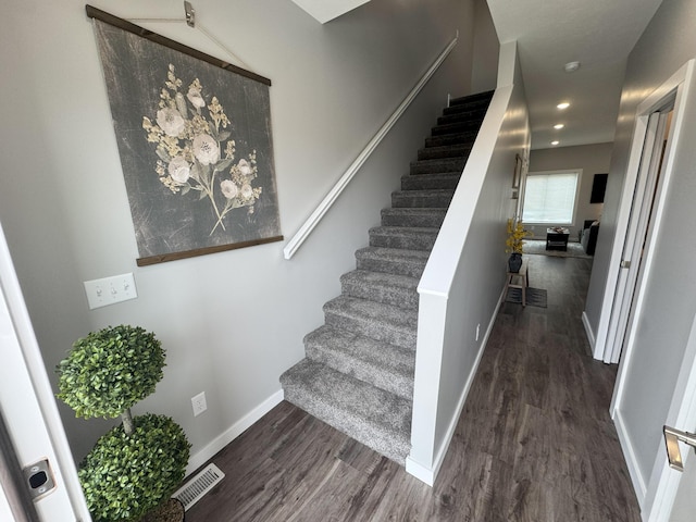 891 Rex St, Fremont, MI 49412 - staircase with wood finished floors and recessed lighting