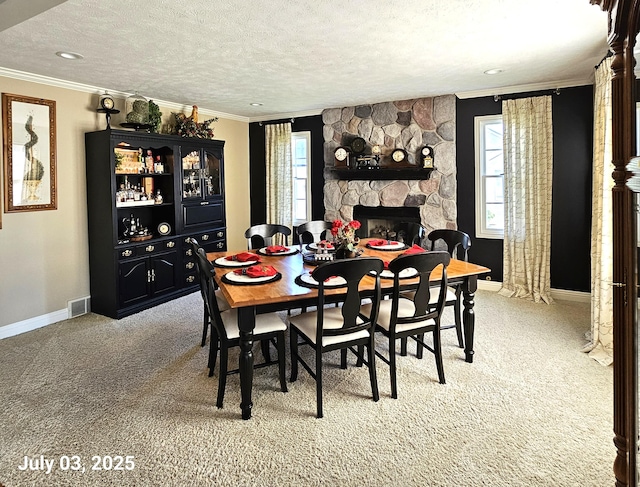 1033 Lumina Dr, Jenison, MI 49428 - dining room featuring crown molding, carpet flooring, a fireplace, a textured ceiling, and recessed lighting