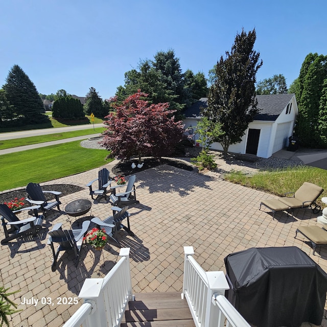 1033 Lumina Dr, Jenison, MI 49428 - view of patio / terrace featuring a fire pit and a grill