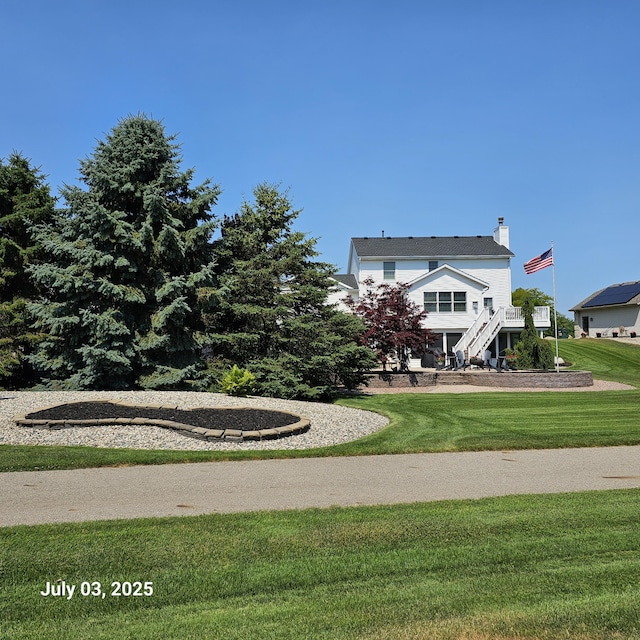 1033 Lumina Dr, Jenison, MI 49428 - view of home's community with stairs and a lawn