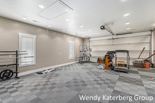 1033 Lumina Dr, Jenison, MI 49428 - garage with recessed lighting and baseboards