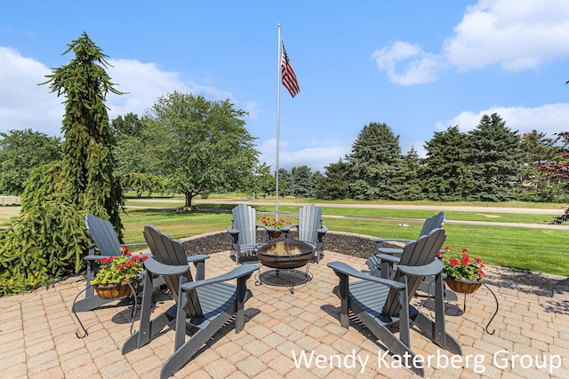 1033 Lumina Dr, Jenison, MI 49428 - view of patio with an outdoor fire pit