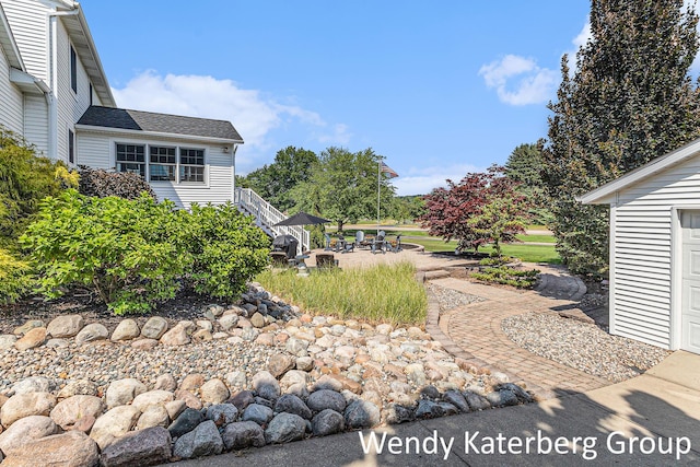 1033 Lumina Dr, Jenison, MI 49428 - view of yard featuring a patio area