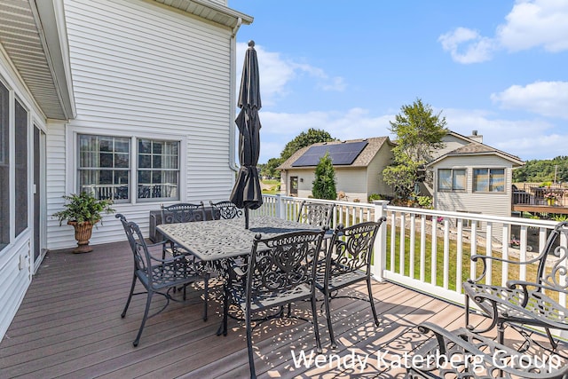 1033 Lumina Dr, Jenison, MI 49428 - wooden deck featuring outdoor dining space