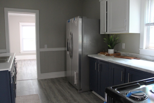 1608 S Rose St, Kalamazoo, MI 49001 - kitchen with range, wood finished floors, and stainless steel refrigerator with ice dispenser