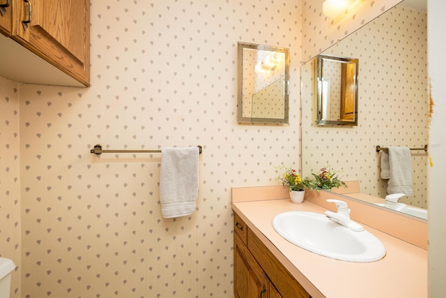2623 Meade Ct, Ann Arbor, MI 48105 - bathroom featuring wallpapered walls and vanity