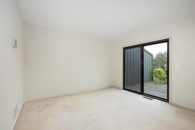 2623 Meade Ct, Ann Arbor, MI 48105 - unfurnished room featuring light carpet and baseboards