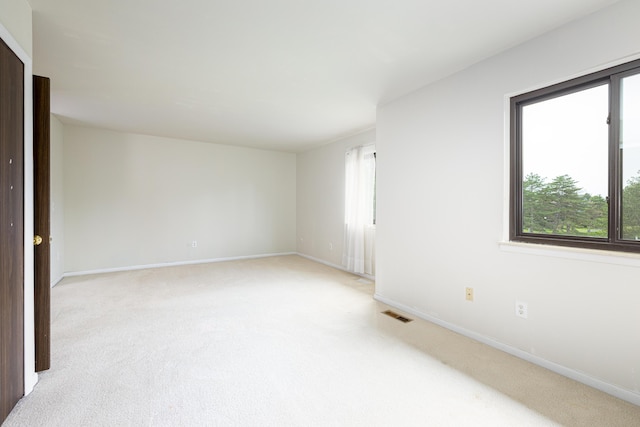 2623 Meade Ct, Ann Arbor, MI 48105 - unfurnished room featuring light colored carpet and baseboards