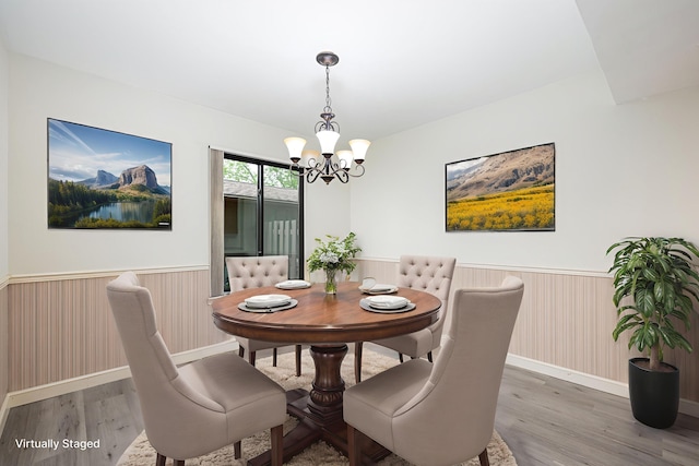 2623 Meade Ct, Ann Arbor, MI 48105 - dining space featuring wainscoting, a chandelier, and wood finished floors