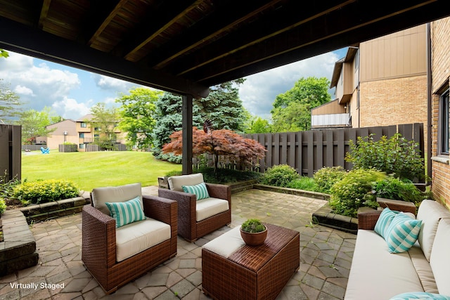 2623 Meade Ct, Ann Arbor, MI 48105 - fenced backyard with a patio and an outdoor hangout area