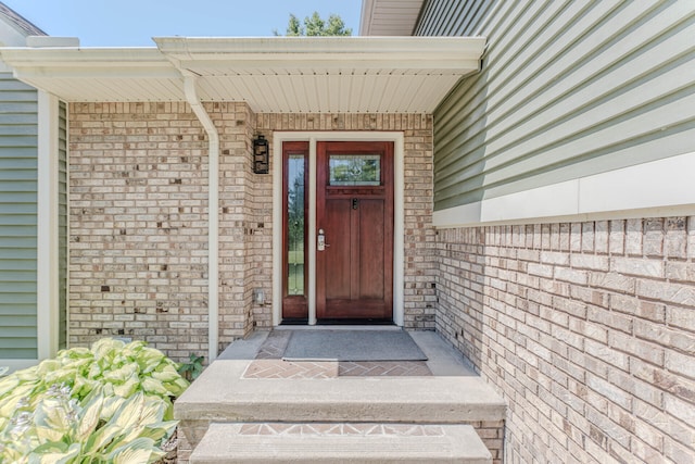 7532 Dell Rd, Saline, MI 48176 - doorway to property featuring brick siding