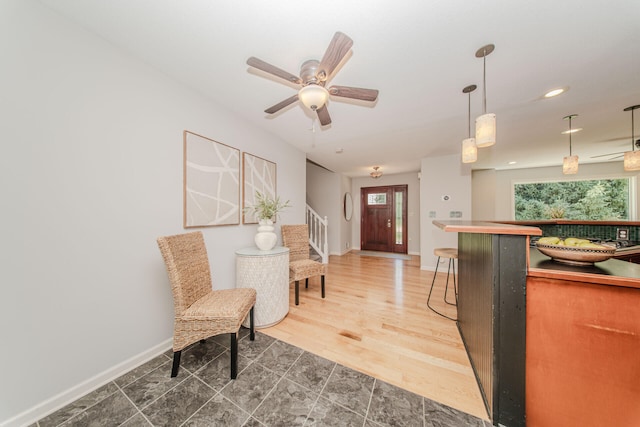 7532 Dell Rd, Saline, MI 48176 - living area featuring stairs, healthy amount of natural light, ceiling fan, and recessed lighting