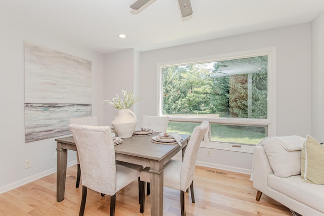 7532 Dell Rd, Saline, MI 48176 - dining space featuring light wood finished floors, ceiling fan, and recessed lighting