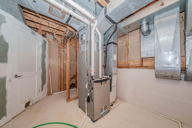 7532 Dell Rd, Saline, MI 48176 - unfinished basement featuring heating unit and concrete block wall