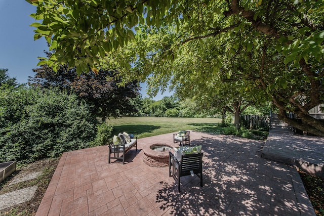 7532 Dell Rd, Saline, MI 48176 - view of patio with an outdoor fire pit